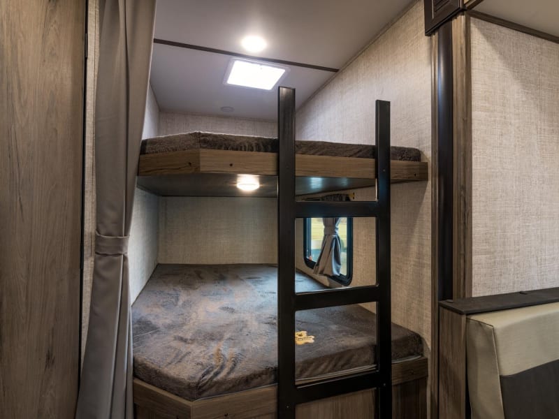 Two Double (Full) size bunks with privacy curtain