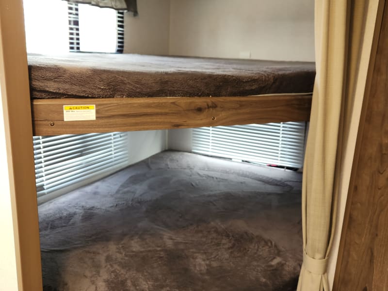 Comfy bunks with plenty of storage under the beds.