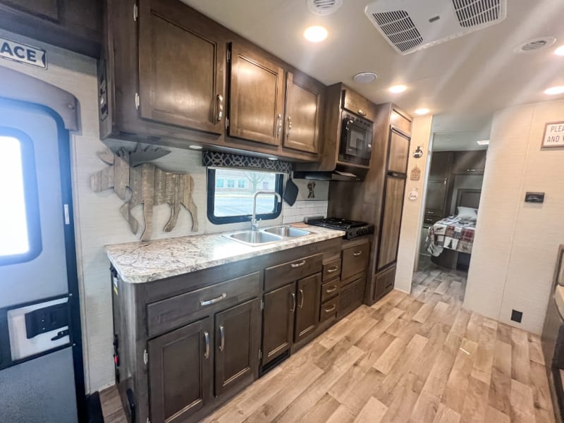 Kitchen view from the cab area. Lots of spacious cabinets. 