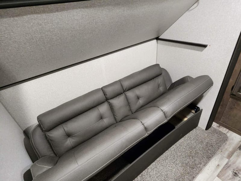 Storage under couch. 