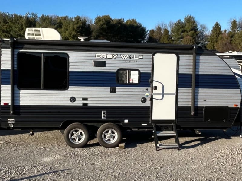 Slide in for traveling.
24 feet from tongue to back of trailer.