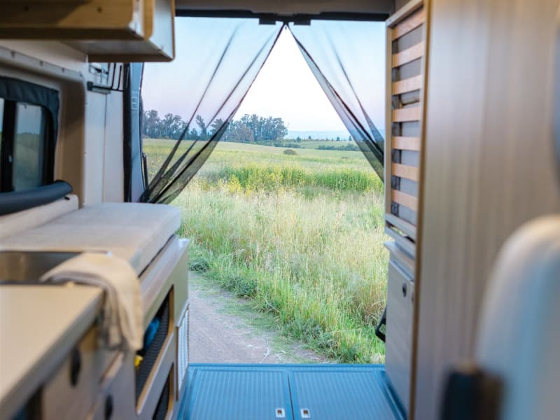 With the Murphy bed stored away, access to additional storage within the gear garage. 