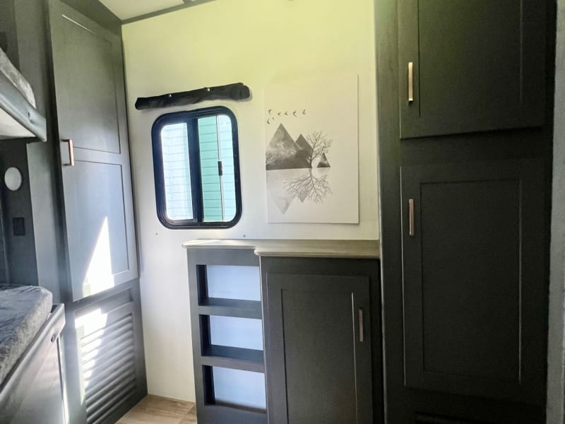 The bunk room with great storage! (Storage size for a camper, that is) 