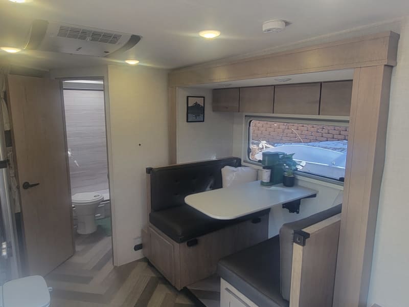 The sliding dinet provides plenty of space for eating, games, and relaxing.