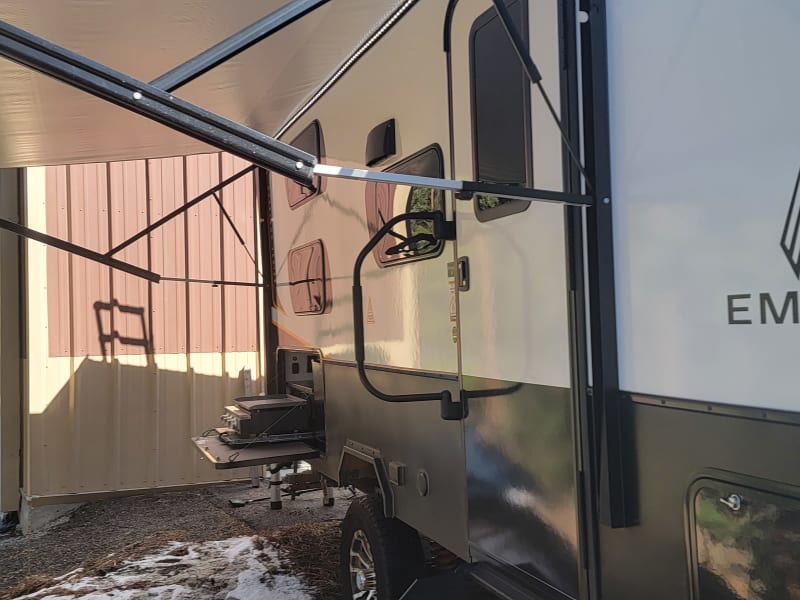 The fully electric awning has a dim-able LED lighting strip.