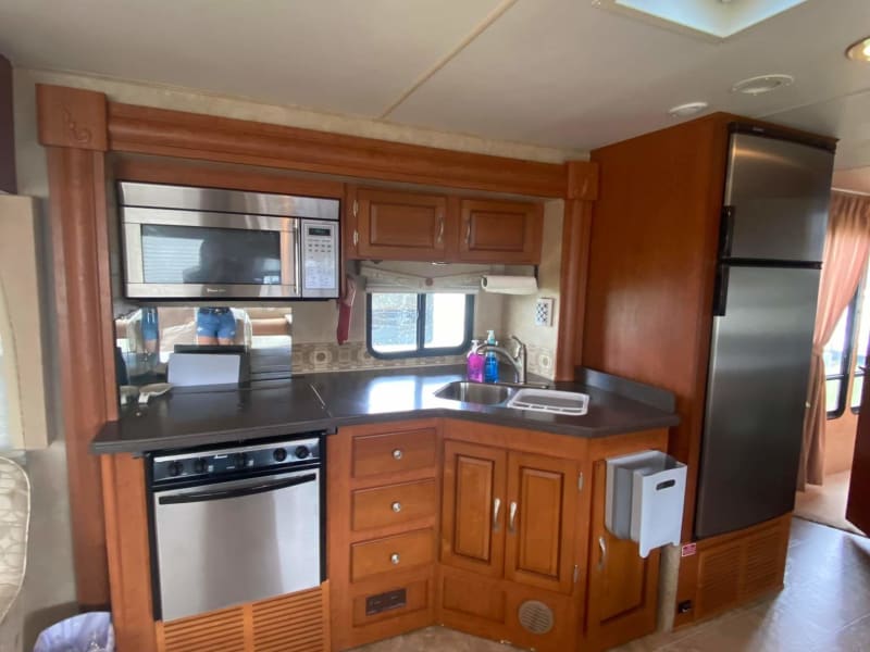 Kitchen is fully stocked including an air fryer and coffee maker.