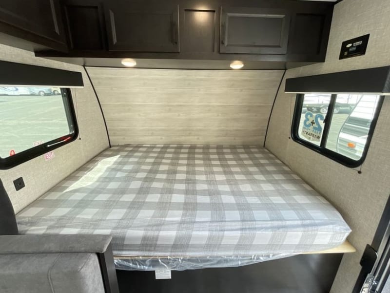 Cozy up in the front Queen bed.