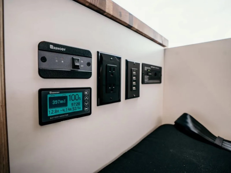 Solar power monitor and switch, USB ports, electrical outlets, carbon monoxide and smoke detector.