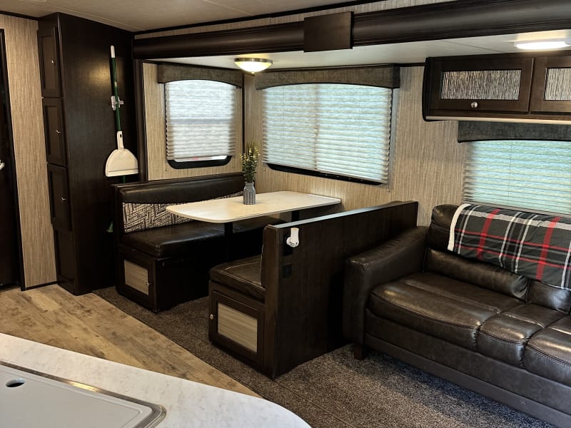 Dinette and couch both fold into sleeping areas. 