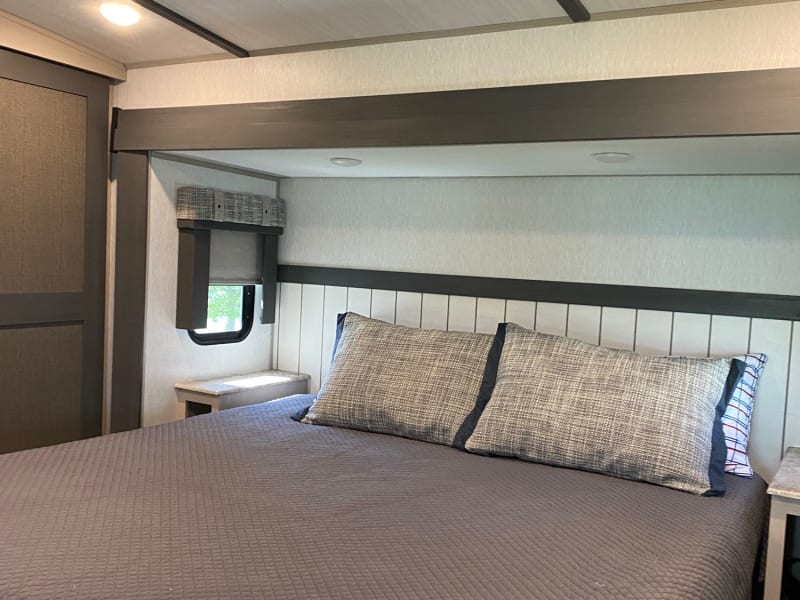 Sleep in luxury! This master suite features a residential king mattress and convenient CPAP plugs and cell phone plugs on each side of the bed.
