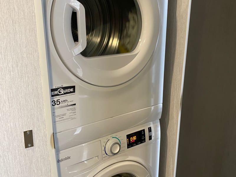 This space includes a stacked washer and dryer for ultimate convenience. Say goodbye to laundromats and enjoy hassle-free laundry at home!