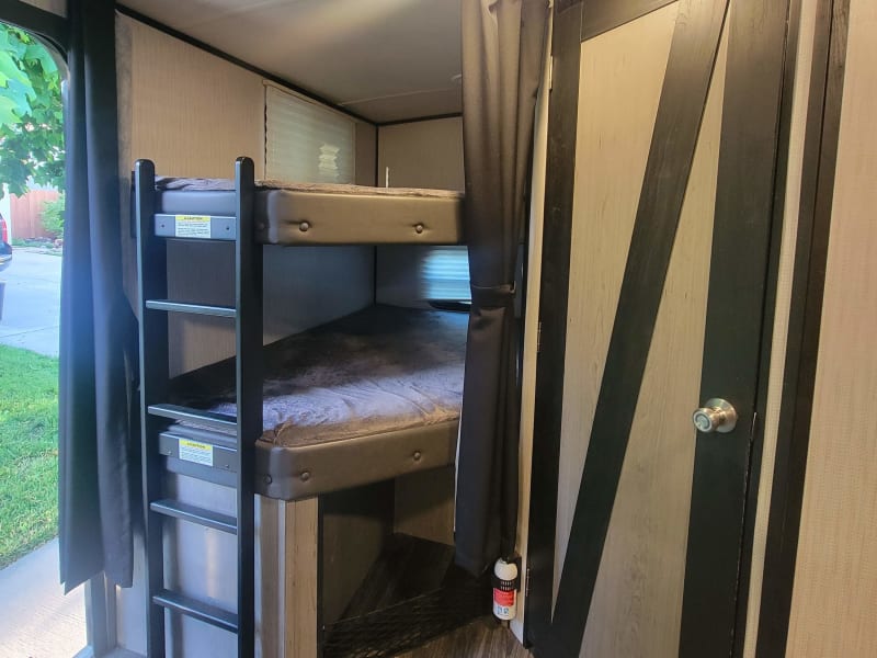 Bunk beds with privacy curtain