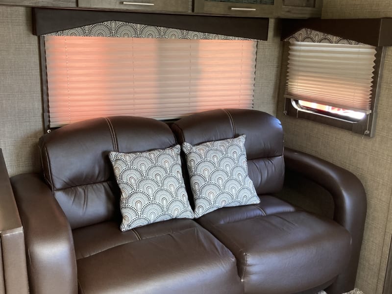 Ultra comfy couch also pulls out into a full size bed.