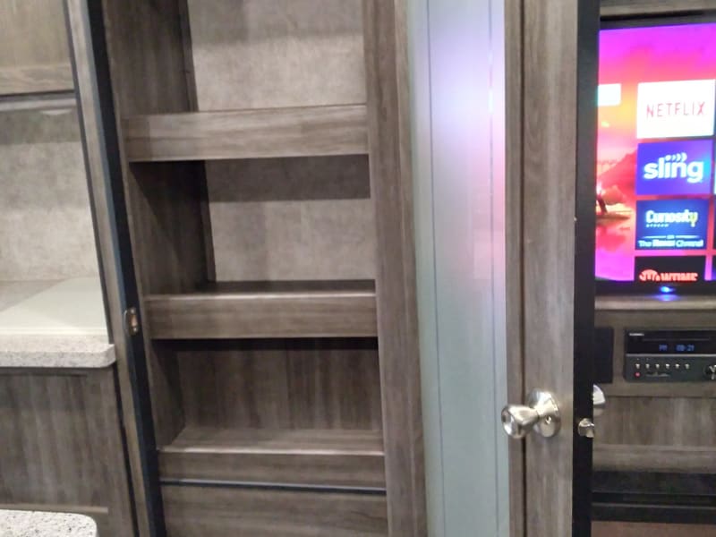 The pantry has lots of room for all the essentials for a fantastic trip!