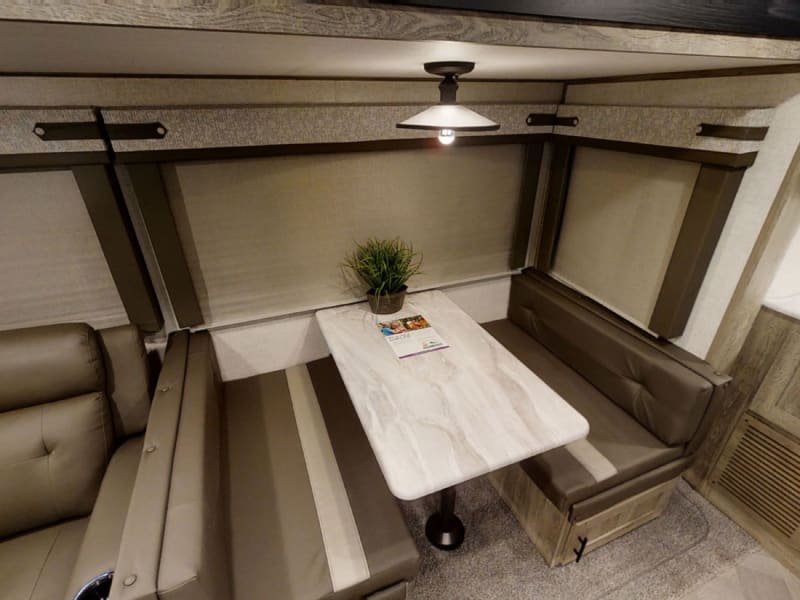 Dining table that converts to a bed