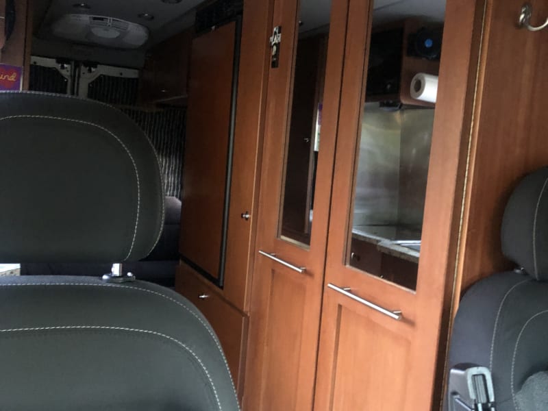 This shows the view from the cab; the bathroom doors are to the right, with the 5.2 cu. ft. refrigerator next toward the rear.