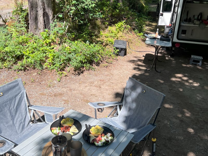 Included rocking camp chairs and foldable camping table #2.