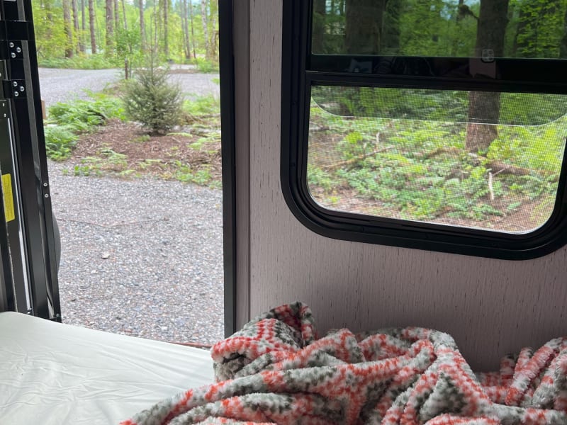 The window opens for ventilation and has a bug net.