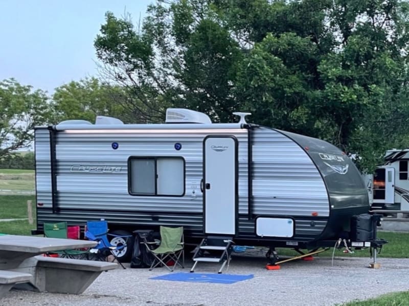This was our very first trip with our camper-  we love the exterior lights and have since added a large, outdoor carpet to enhance our outdoor space!