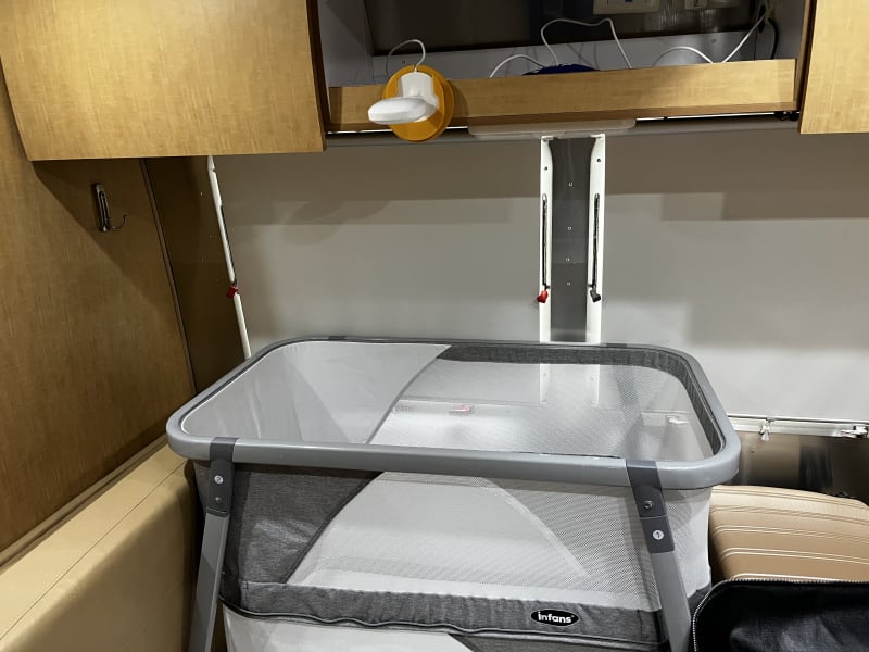 Converted dinette is the perfect spot for a pack-n-play!