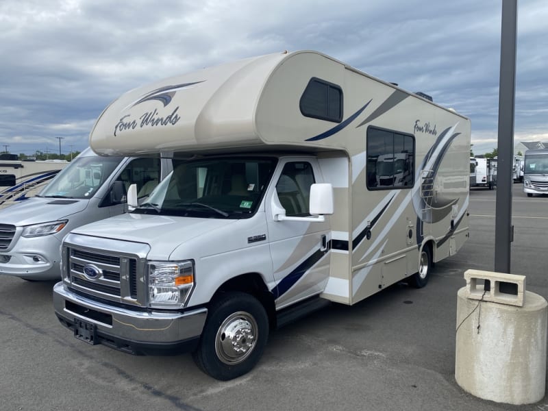 Small enough to fit into a tailgating lot. Ample room for chairs & a grill. Built in folding table. Perfectly toasty tailgate! Go Birds!