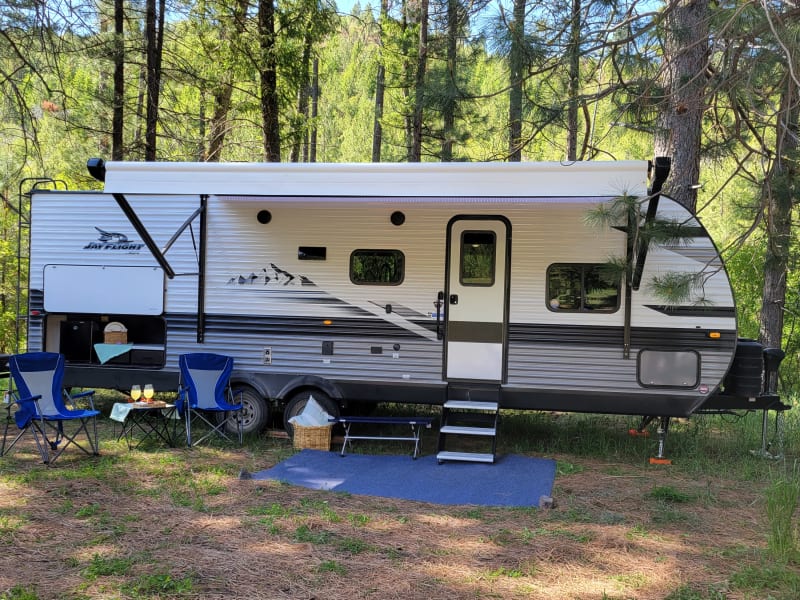 The trailer all set up for a relaxing camping trip!