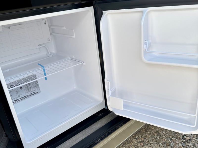 Outdoor fridge. Only works on electric (i.e. generator, or shore power)