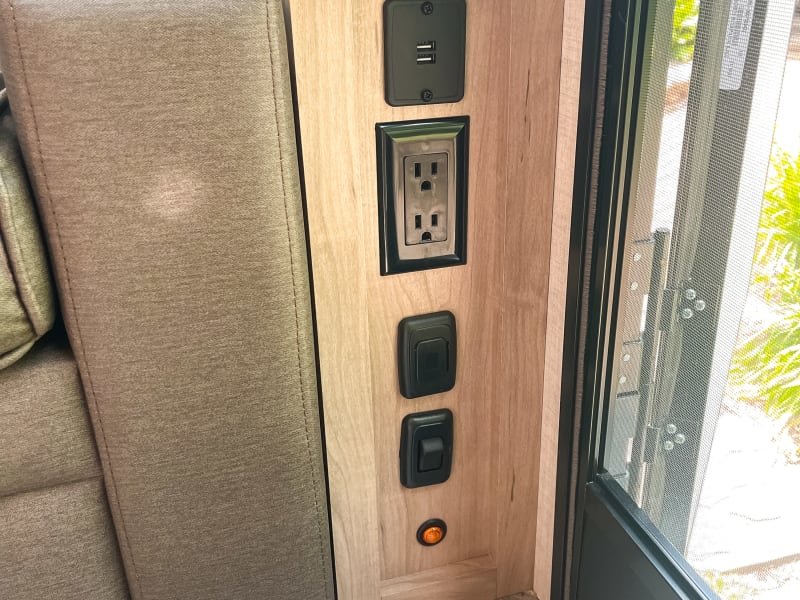 USB ports and outlets near bed