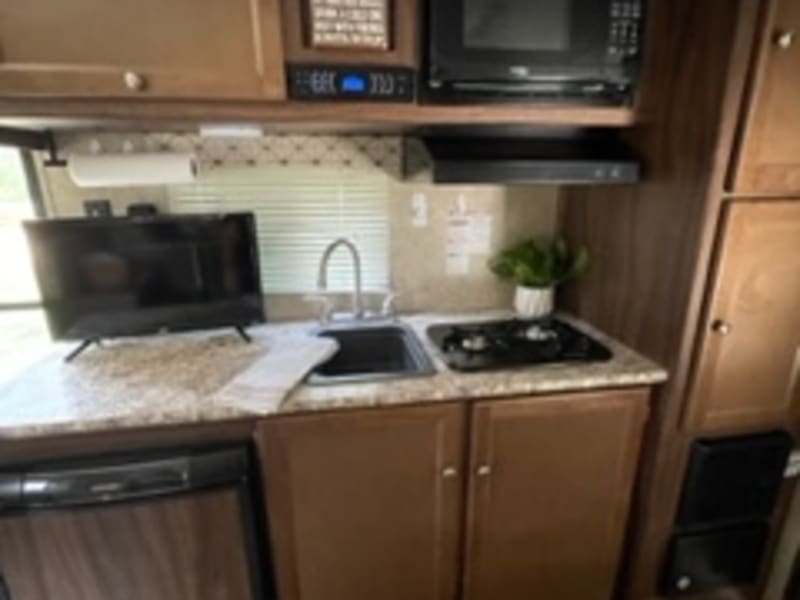 Kitchen with storage and smart TV
