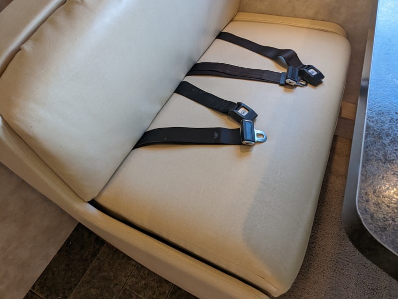 4 sets of seatbelts at the dinette