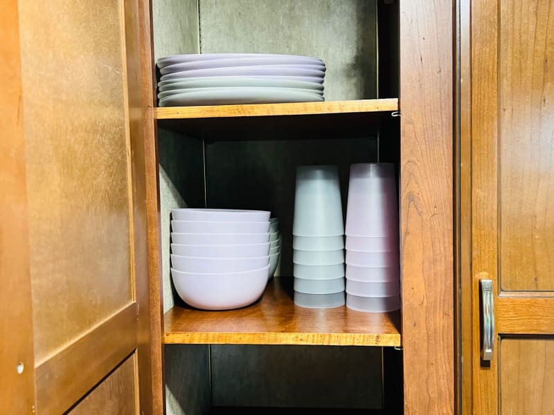 Indoor plates, bowls, cups, and glasses for 8.