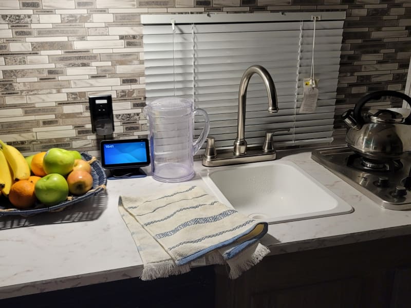 Interior shot of possible setup. Counter space, stove top and sink and the water kettle included and available for use. 