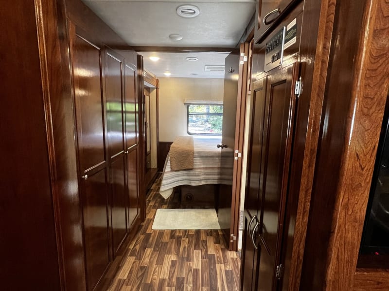 Hall, bunks behind folding doors, master