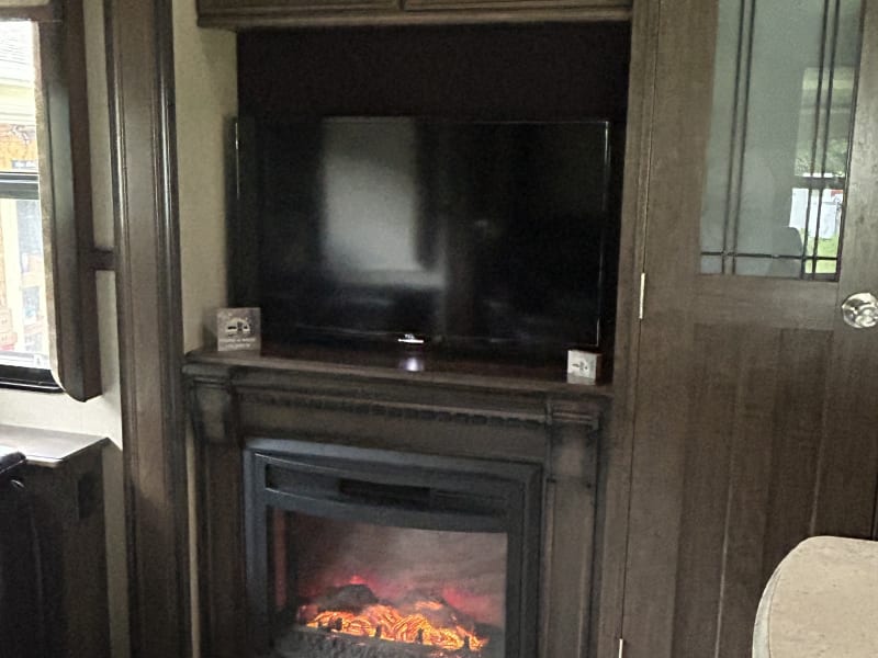 large Roku tv and fireplace