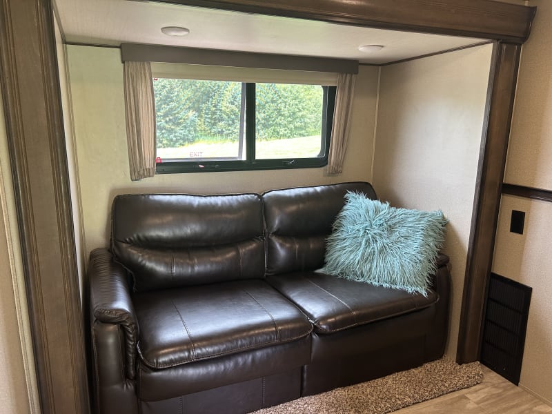 bunkroom with leather queen pull-out sofa