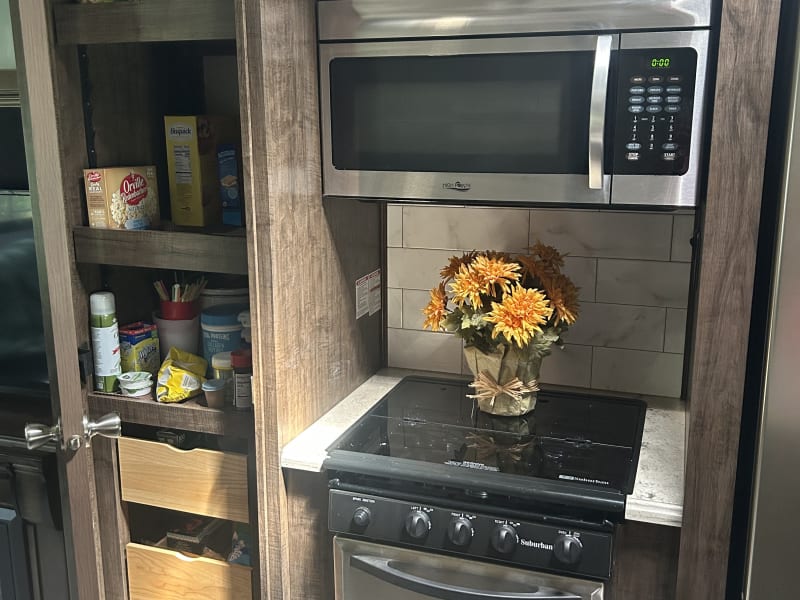 large pantry
microwave/convection oven and propane stove/oven