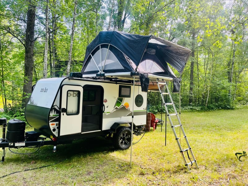 Exterior showing optional rooftop tent add on. The tent is 80 inches, equivalent to a king sized bed!