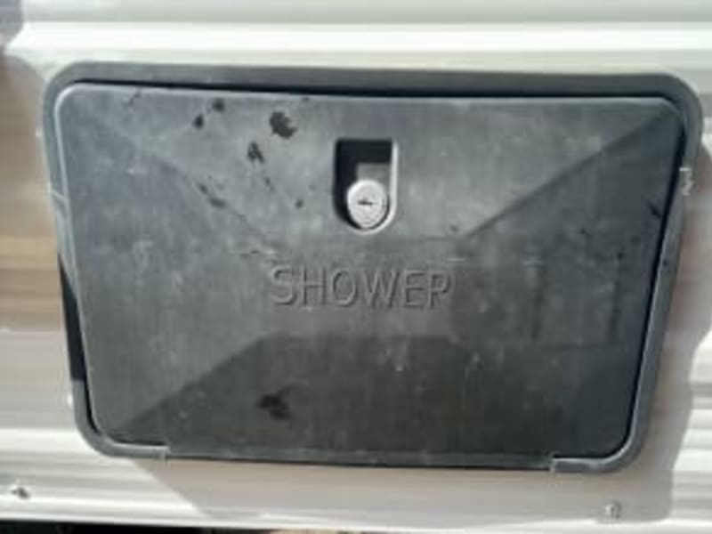 outdoor shower- located on back end of the camper.