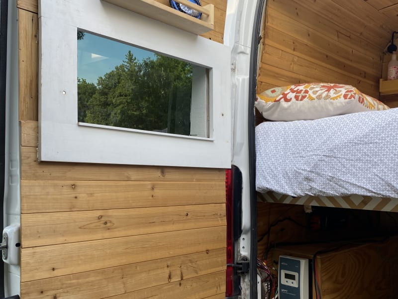 Under the bed is the basement/garage. Utilitarian with enough space for toys.