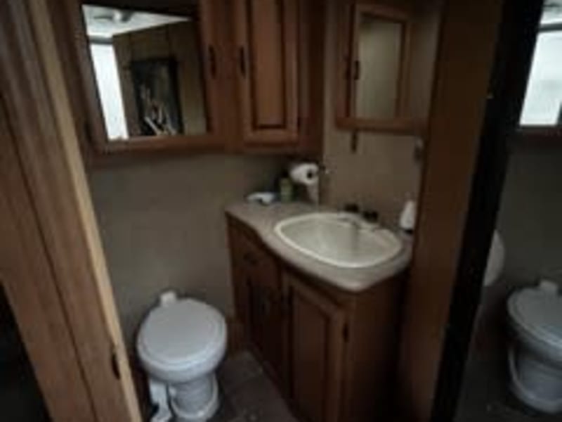 Private toilet and sink.  Plenty of storage! 