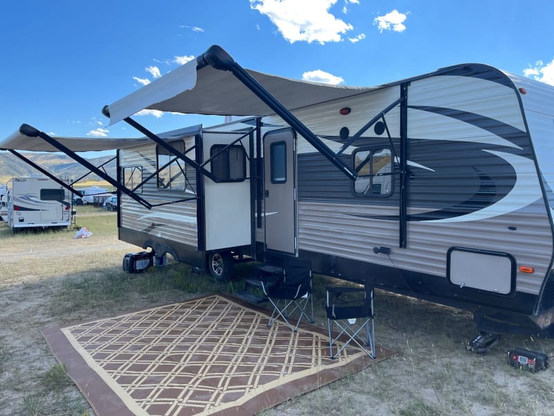 Rockin’ The Rivers 2023, Cardwell MT. Power awnings provide ample shade! Outdoor rug included!