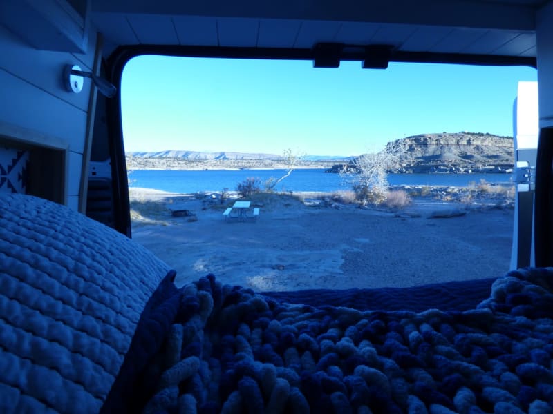 Great view from the bed in lakeside campground. Late fall trip so no need for the magnetized rear door bug-screens!