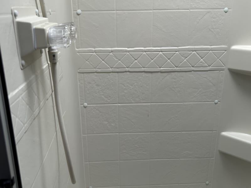 Shower is heated by on-demand water heater.