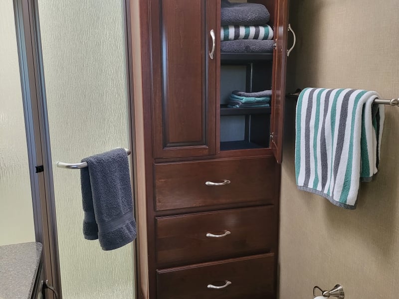 Shower and linen storage