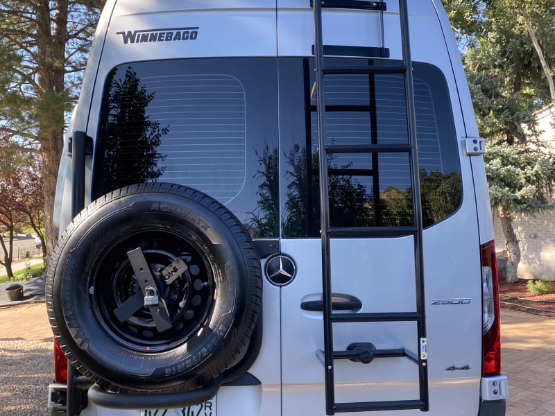 Full size spare, hitch step