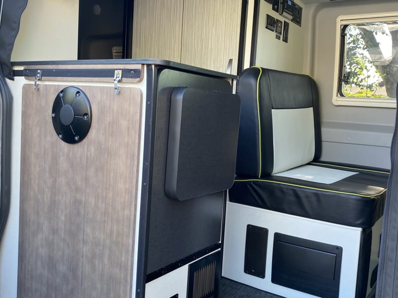 Fold down table and power awning controls