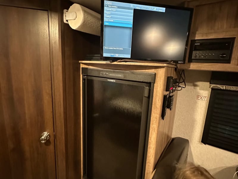 TV with antenna and satellite hook up option. DVD player and large refrigerator. 