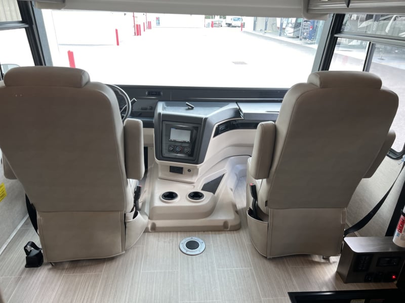 Auto adjusting chairs including swivel