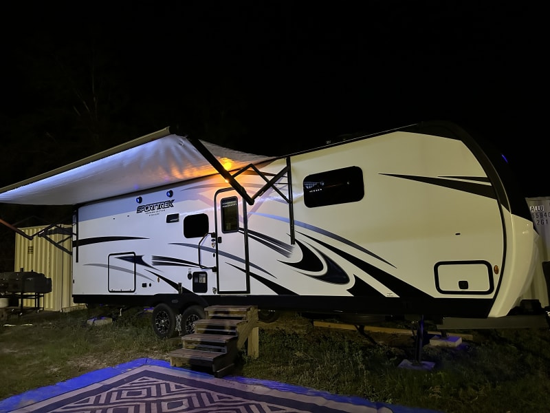 Exterior side with entryway and awning 