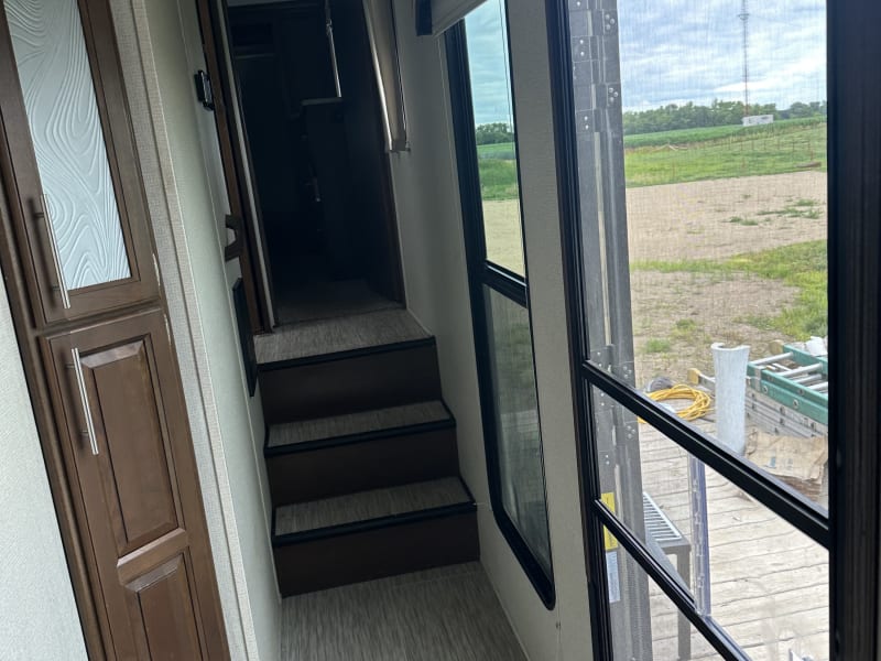 The light switches and switches for the slide outs are in the hallway cabinet. 